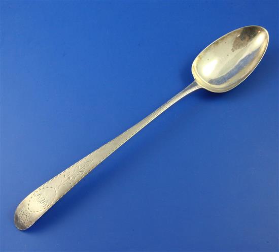 A George III Irish bright cut engraved silver basting spoon, 2.5in.